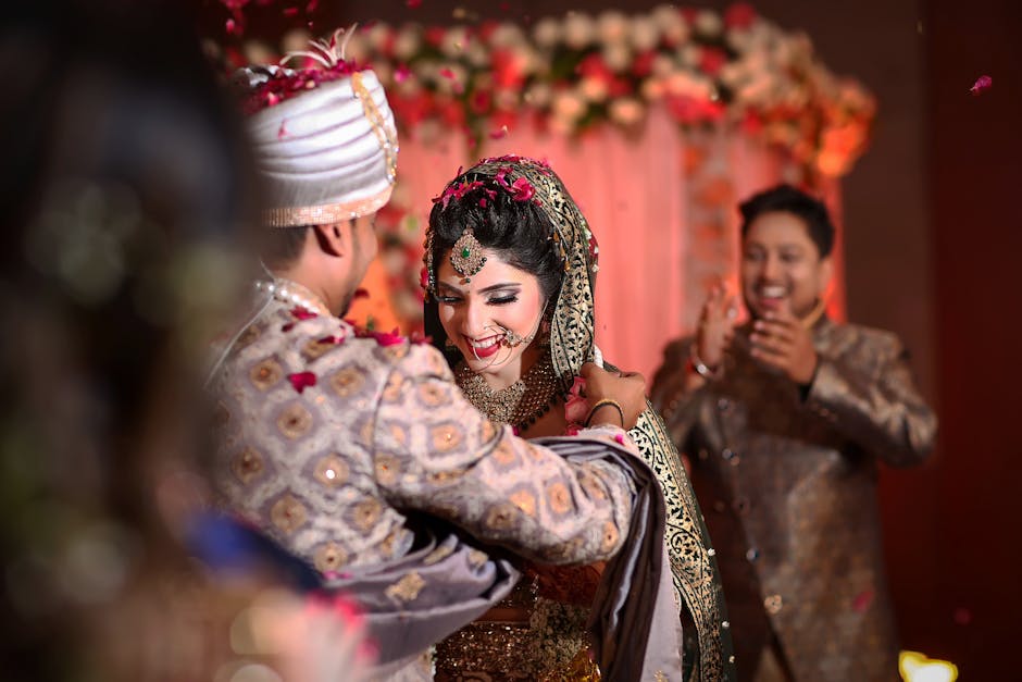 Joyful Indian couple sharing a heartfelt moment during their wedding ceremony.